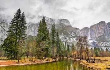 The Merced river and Upper Yosemite Fall in Yosemite National Park - California, United States