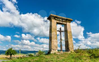 Christian cross in a field on the border between Presov and Kosice regions in Slovakia.