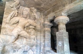 Hindu sculptures in the cave 1 on Elephanta Island. Mumbai - Maharashtra, India