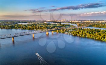 Aerial panorama of the Dnieper with the Petrovsky Railway Bridge in Kiev, the capital of Ukraine