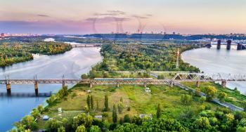 Kiev Urban Electric Train on the Petrovsky Railway Bridge across the Dnieper in Ukraine