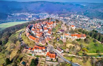 Aerial view of Dilsberg, a town with a castle on the top of a hill surrounded by a Neckar river loop. Germany, Baden-Wurttemberg