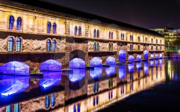 Night illumination of Barrage Vauban (Vauban weir) in Strasbourg