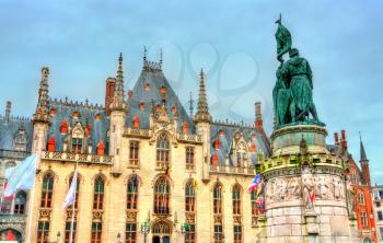 Statue of Jan Breydel and Pieter de Coninck and the Provinciaal Hof Palace in Bruges - Belgium