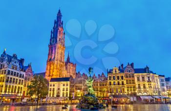 The Cathedral of Our Lady and the Silvius Brabo Fountain on the Grote Markt Square in Antwerp - Flanders, Belgium