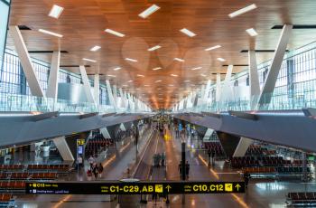 Doha, Qatar - August 4, 2019: Interior of Hamad International Airport. The airport opened on 30 April 2014 and now accomodates over 35 million passengers per year