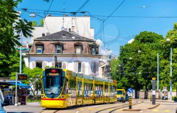 Basel, Switzerland - June 10, 2016: Stadler Tango tram in the city centre of Basel.