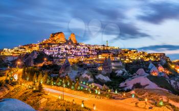 View of Uchisar with the castle at sunset. Cappadocia, Turkey
