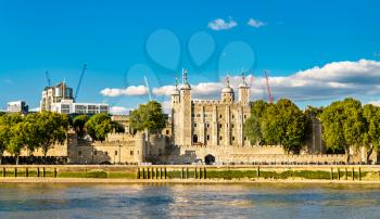 The Tower of London, a historic castle on a bank of the Thames River
