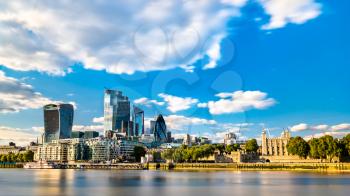 Skyscrapers of the City of London and the Tower of London at the Thames River, England