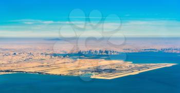 Aerial view of Doha and Hamad International Airport. The capital of Qatar