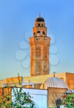 Minaret of Zaouia Kadria Mosque in the medina of Tozeur, Tunisia. North Africa