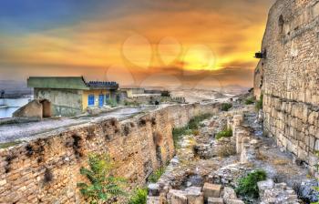 Sunset above the walls of the Kasbah, a medieval fortress in le Kef, Tunisia. North Africa