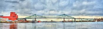 Panorama of Jacques Cartier Bridge crossing the Saint Lawrence River in Montreal - Quebec, Canada