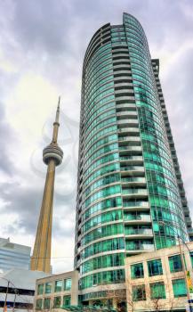 Toronto, Canada - May 2, 2017: CN Tower and another skyscraper in downtown of Toronto. The CN Tower is a 553.3 m-high concrete communications and observation tower