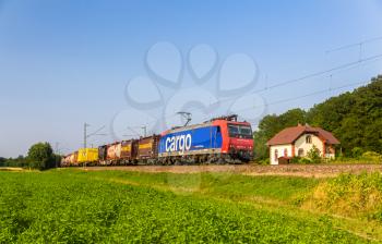 OFFENBURG, GERMANY - JULY 10: Freight train of Swiss Federal Railways on JULY 10, 2013 in Offenburg, Germany. In 2012, SBB Cargo earned operating revenues of CHF 922 million