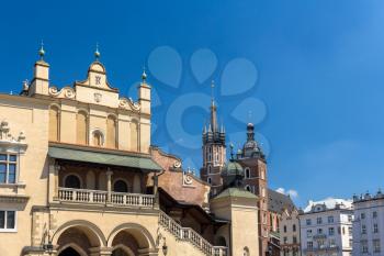 Sukiennice and St. Mary Basilica in Krakow - Poland
