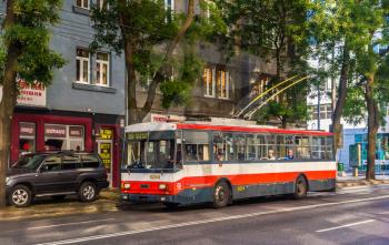 BRATISLAVA, SLOVAKIA - AUGUST 11: An old Skoda 14Tr10/6 trolleybus in Bratislava on August 11, 2013. There are 13 trolleybus routes in Bratislava