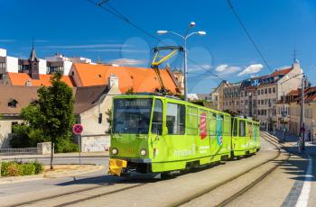 BRATISLAVA, SLOVAKIA - AUGUST 11: A Tatra T6A5 tram in Bratislava on August 11, 2013. Trams in Bratislava have 1000 mm gauge and catenary with 600 V 