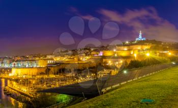 Night view of Fort St. Nicolas and Notre-Dame-de-la-Garde in Marseille, France