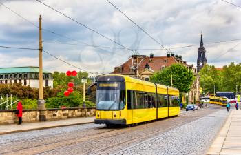 City tram on Augustus bridge in Dresden - Germany