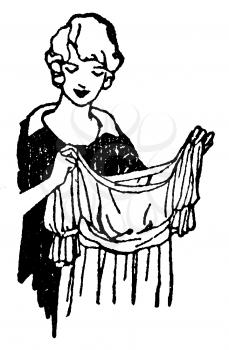 Royalty Free Clipart Image of a Woman Admiring a Dress