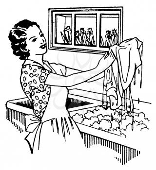 Royalty Free Clipart Image of a Woman Doing Laundry 