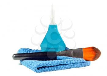 Enema and cosmetic brush and cloth isolated on white background