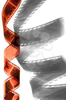 Spiral of colored film with black and white shadow