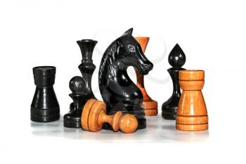 Some chess figures with reflection on white background