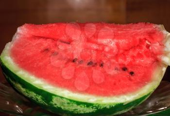 Ripe sliced watermelon in a plate of glass