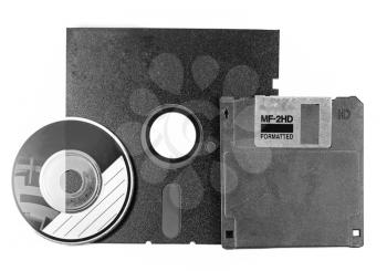 Two floppy disks and CD-ROM on a white background