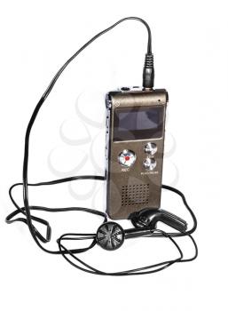 Voice recorder with headphones on white background