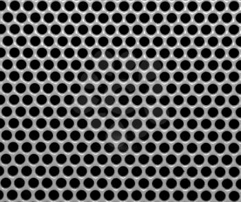 Pattern of the gray metallic background with holes