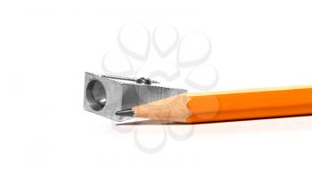Pencil and Sharpener isolated on a white background close up