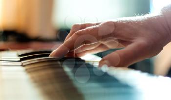 Stylized hand of pianist  in motion close up