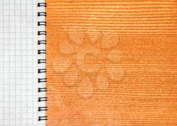 Abstract background and parts of a diary with a binder and wooden texture