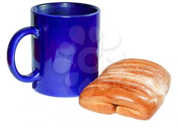 A cup and a bun isolated on white background