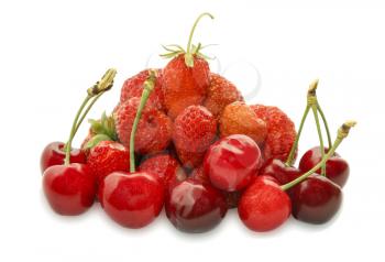 Ripe strawberries and sweet cherry isolated on white background