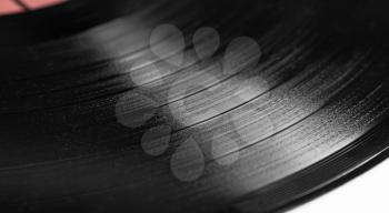 Part of phonograph records on white background close up