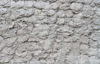 Background from a surface covered with plaster