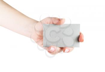 Blank business card in hand. Isolated with clipping path on white background. Template for design presentations and portfolios.
