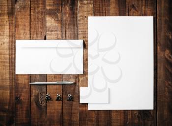 Blank stationery template for branding identity for designers. Blank stationery set on vintage wooden table background. Mock-up for branding identity for designers.