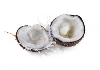 Coconut with milk splash isolated on white background