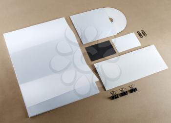 Blank corporate identity set on a table. Top view.