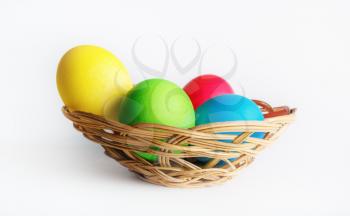 Basket of Easter eggs. Bright colorful easter eggs.Selective focus.
