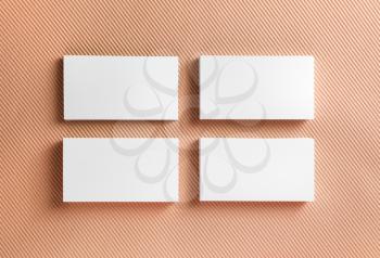 Blank business cards on color background. Top view.