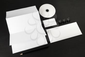 Photo of blank stationery. Corporate identity template on black background.