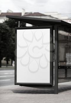 Blank billboard at the bus stop. Street blank poster. Isolated with clipping path. Selective focus.