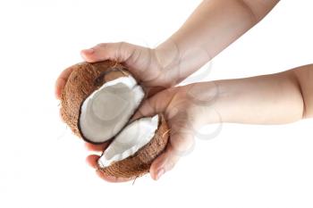 Coconut, break in half, in female hands. Isolated on white background.